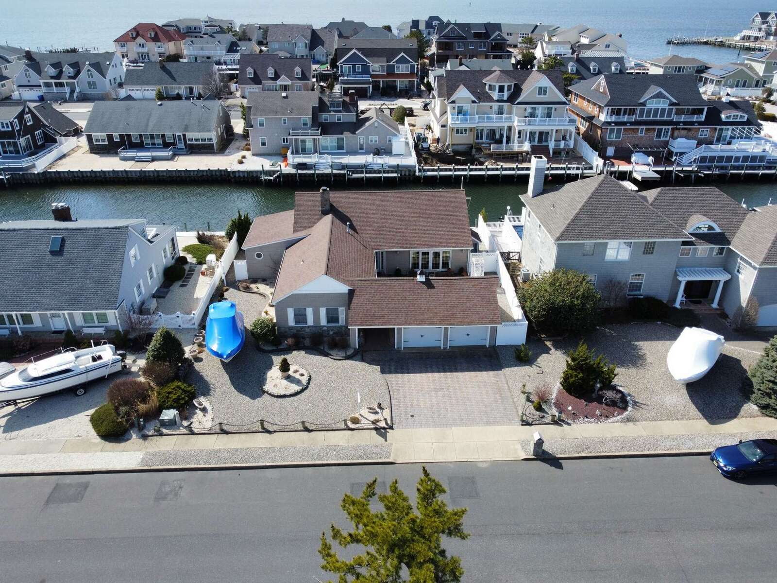 drone photo of a property on the water